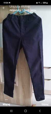 Nowe eleganckie spodnie 140 do szkoly, firmy reserved