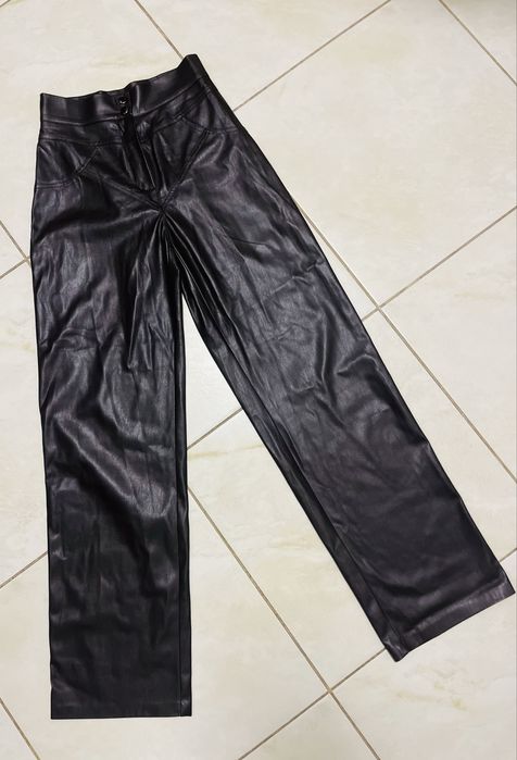 Кожзам штани широкі труби