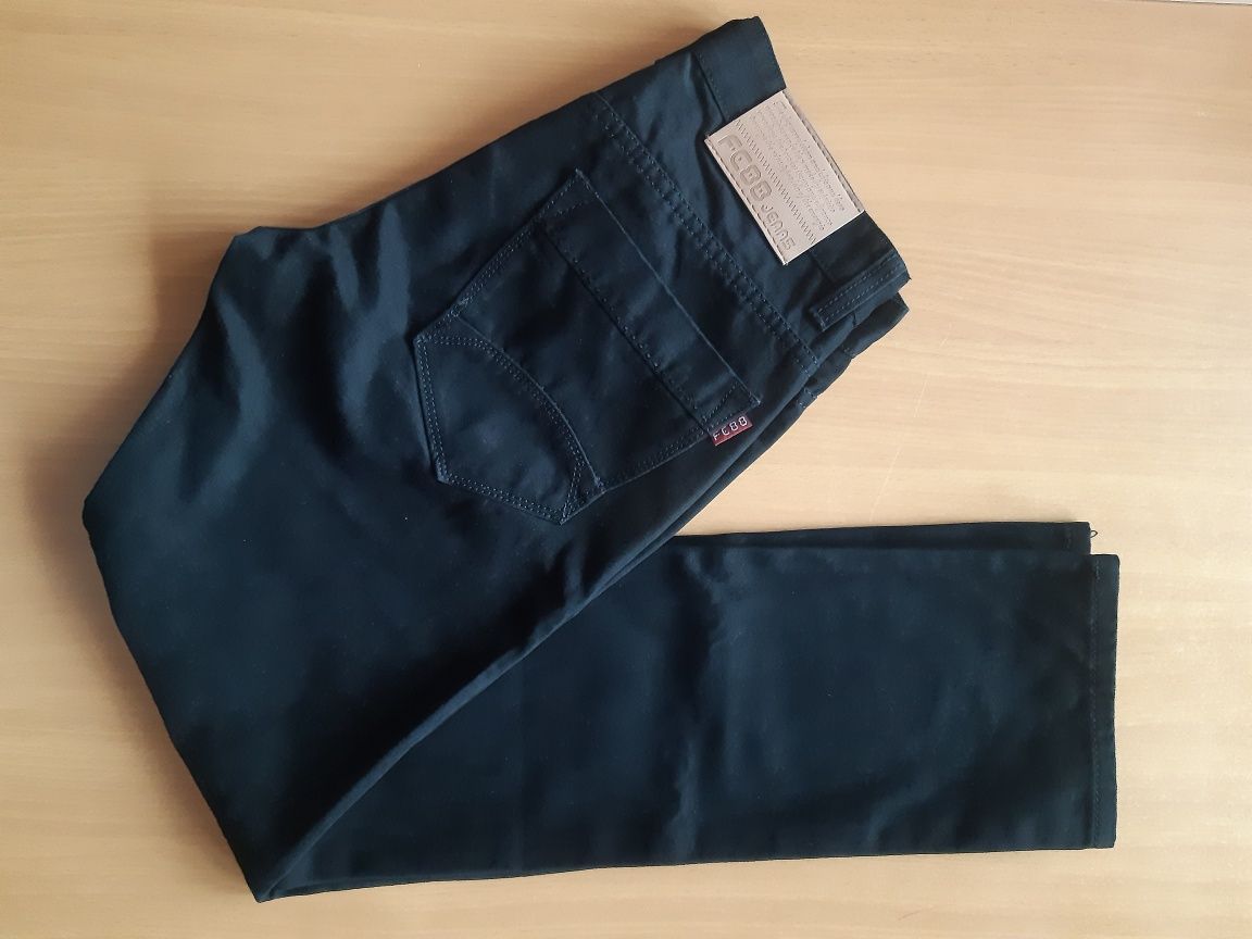 Czarne męskie spodnie klasyczne jeansy Rozm 31 Pas 82