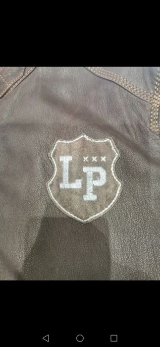 Blusão lion of porches