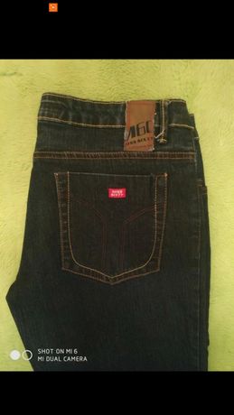 Spodnie jeansowe modne  dzwony wygodne stylowe  42/44