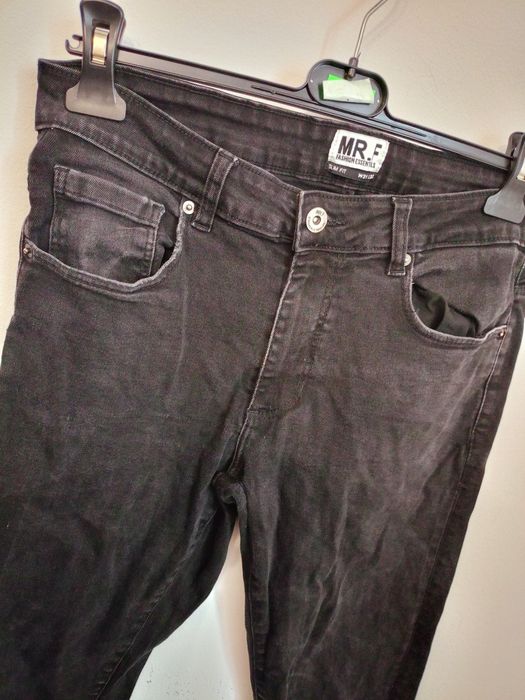 Spodnie męskie .