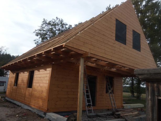 Budowa domów drewnianych z bala montaż domów z paczki prefabrykowanych