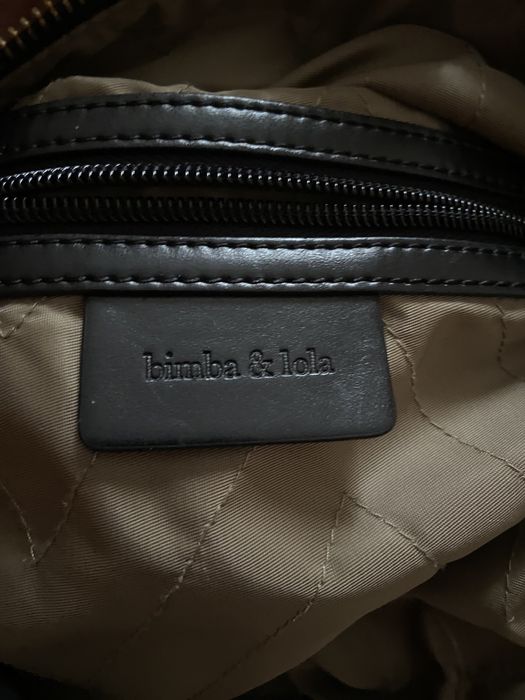 Mala Bimba & Lola ombro e mão