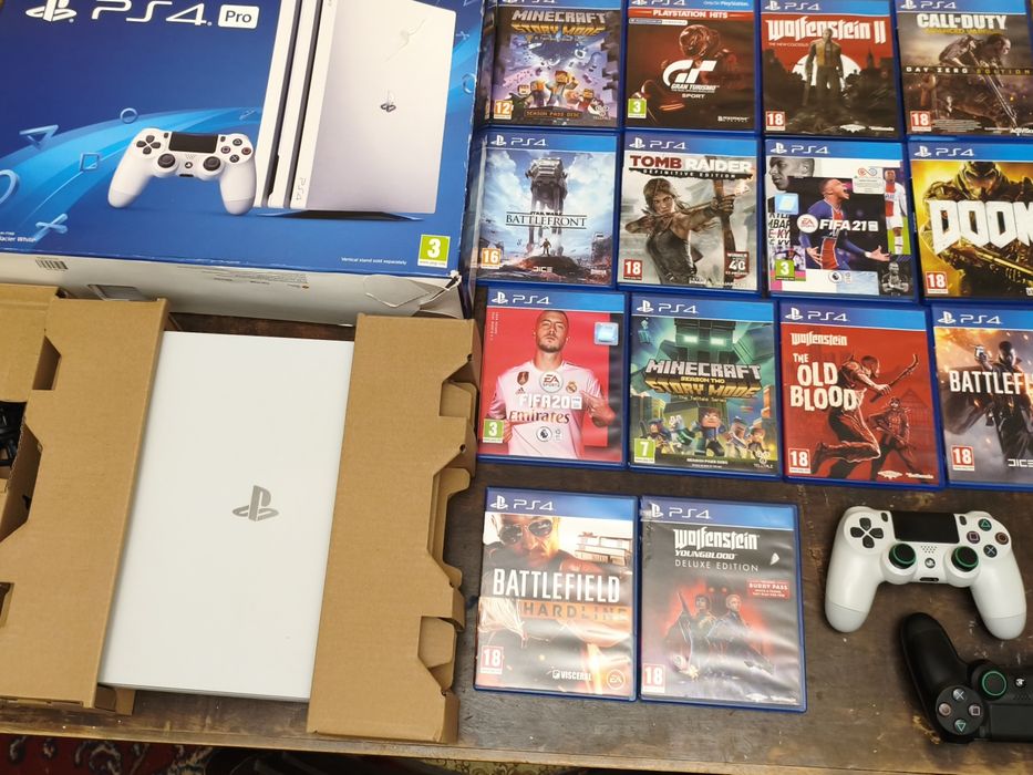 PS4 PRO biała 1TB + 2 pady + 14 gier. CUH-7116B