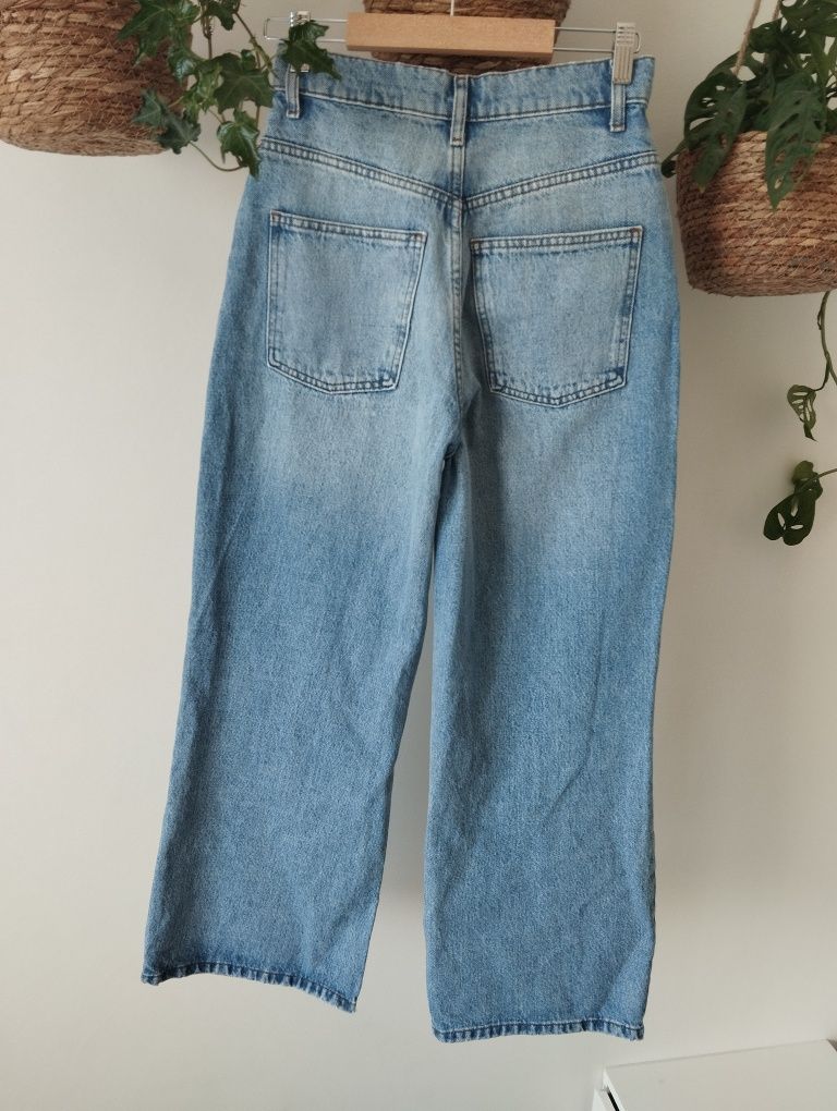 Jeansowe spodnie z szeroką nogawką, z dziurami, petite r. S 26/28 ASOS