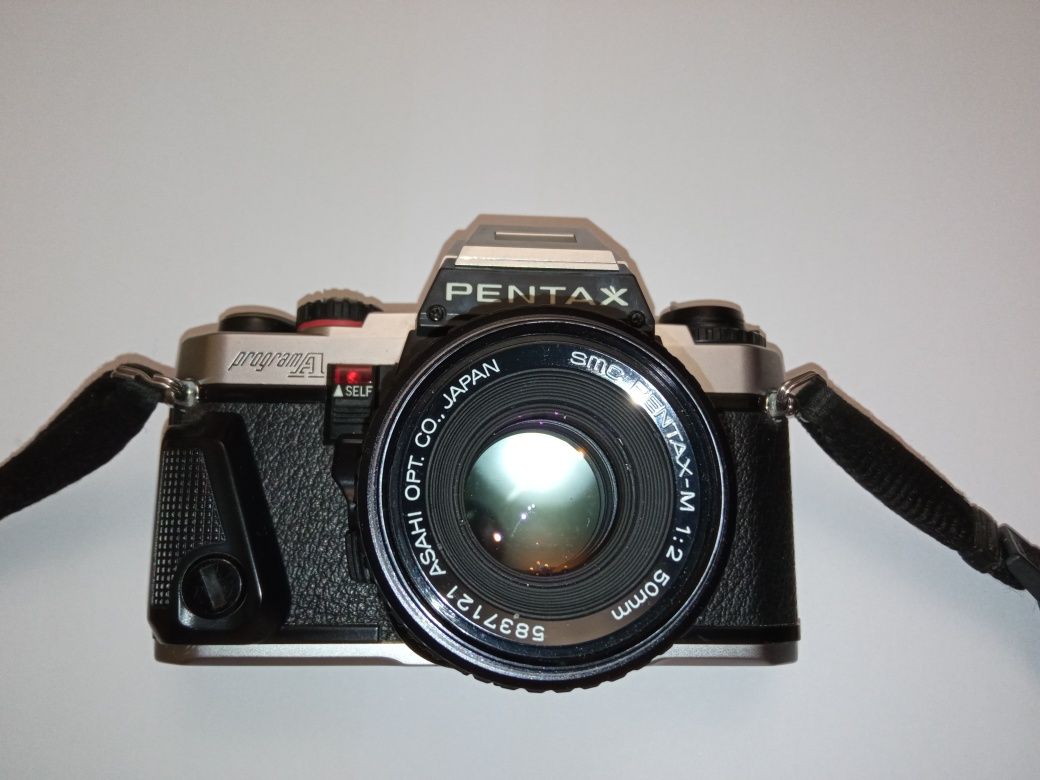Продам фотоапарат Pentax в идеальном состоянии.