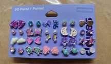 20 brincos Claire's