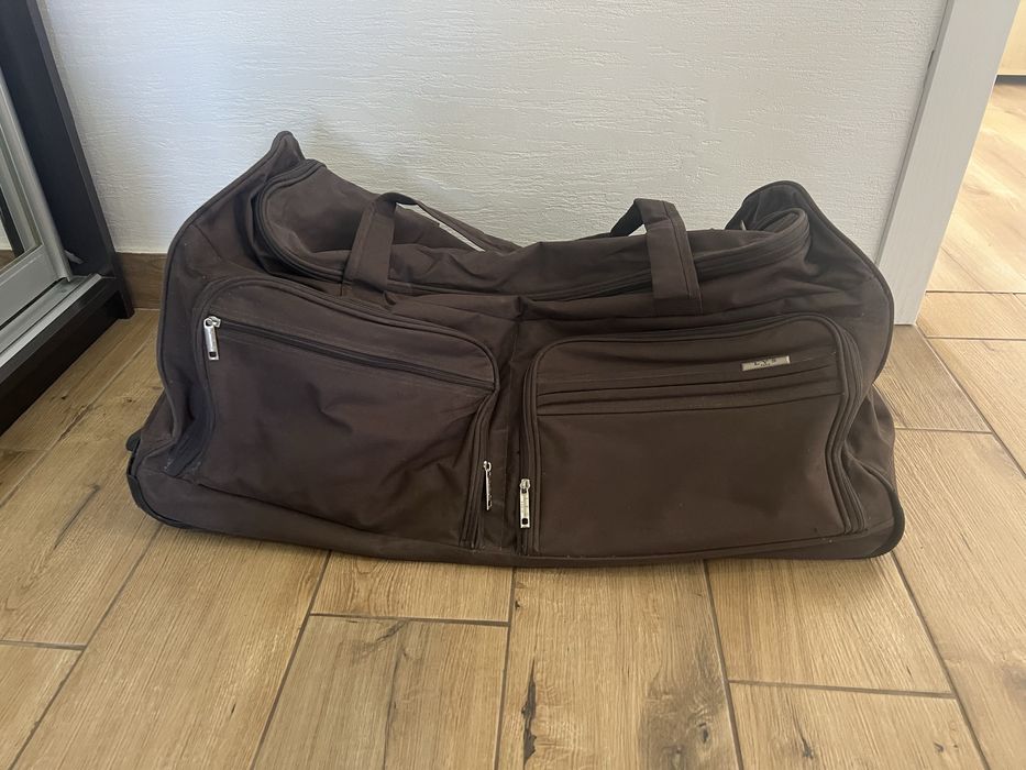 Дорожня валіза, сумка на колесах