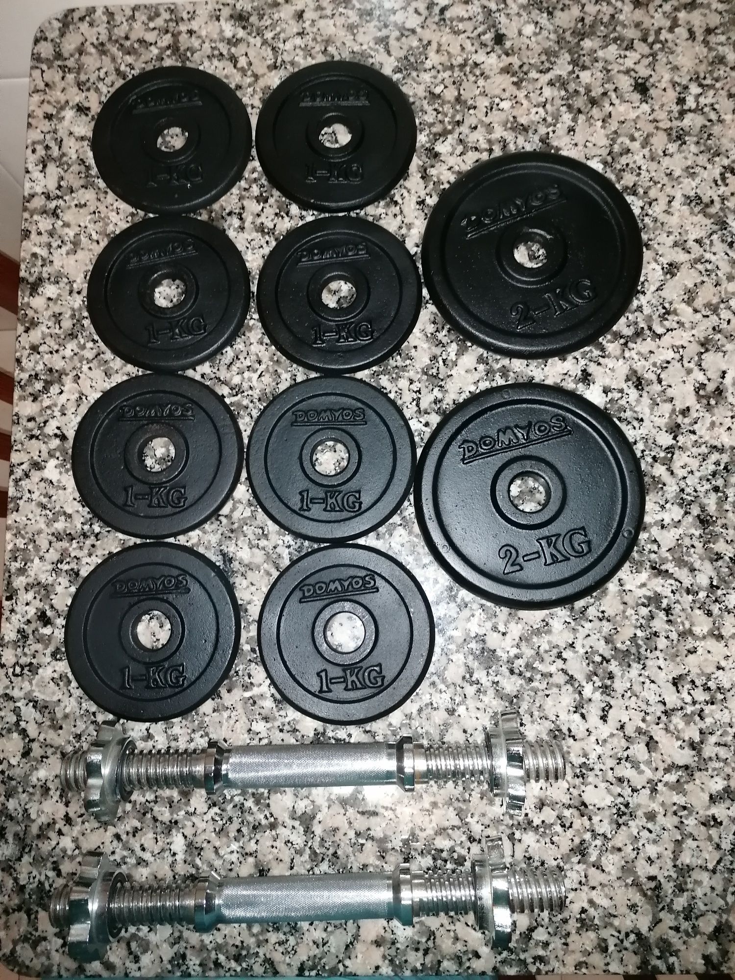 Discos de peso e barras de halteres