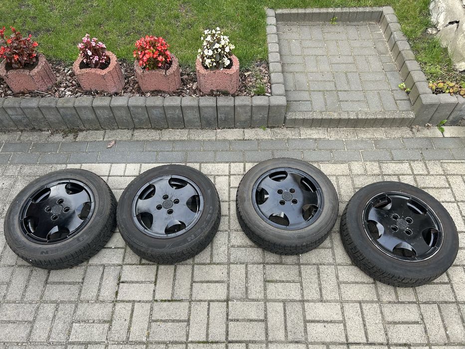 Opony zimowe z felgami aluminiowymi VW Golfa III