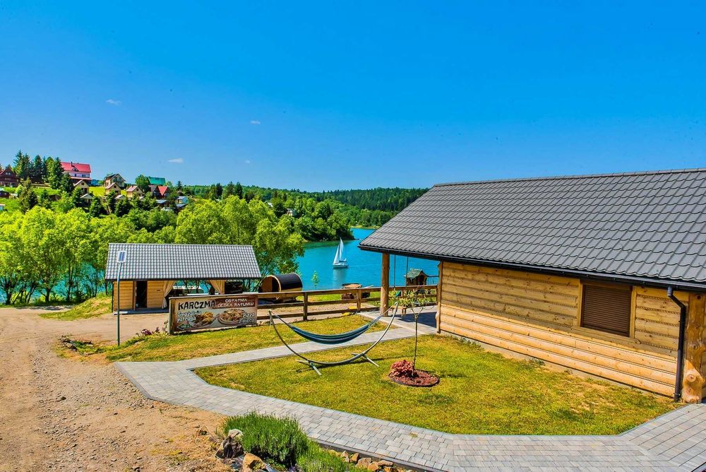 Domek z jacuzzi sauną nad jeziorem  w Bieszczadach własna plaża 30%