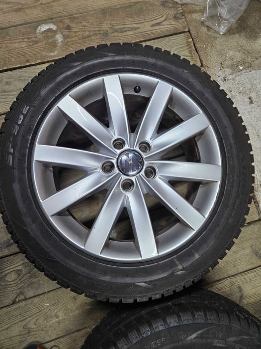 Felgi aluminiowe vw original  opony zimowe Sunfull
