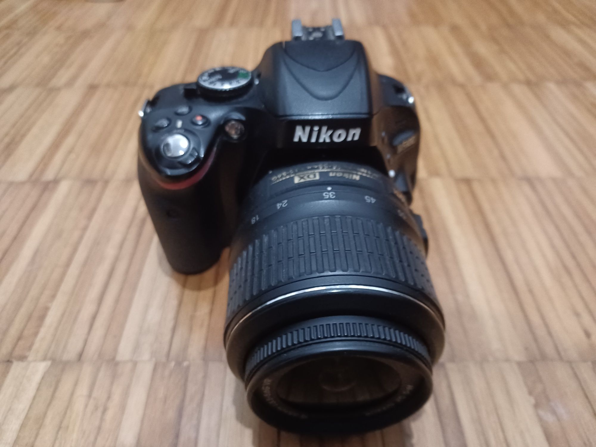 Nikon D5100 + Objetiva 18-55mm + 3 baterias