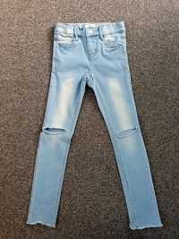 Jasne spodnie jeansowe z dziurami / przetarciami Name It 122 rurki