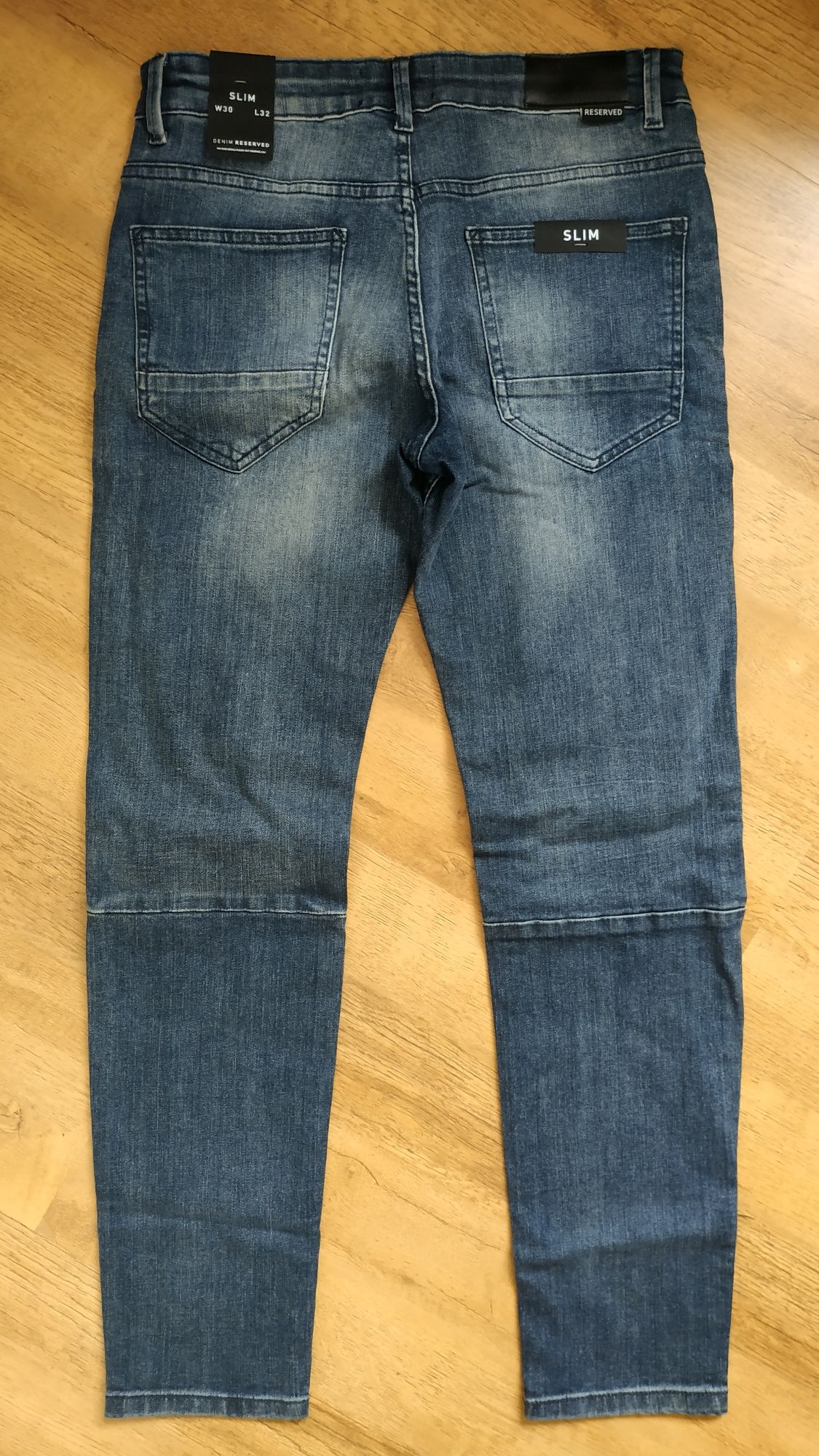 Spodnie jeansowe NOWE Reserved, rozm. M