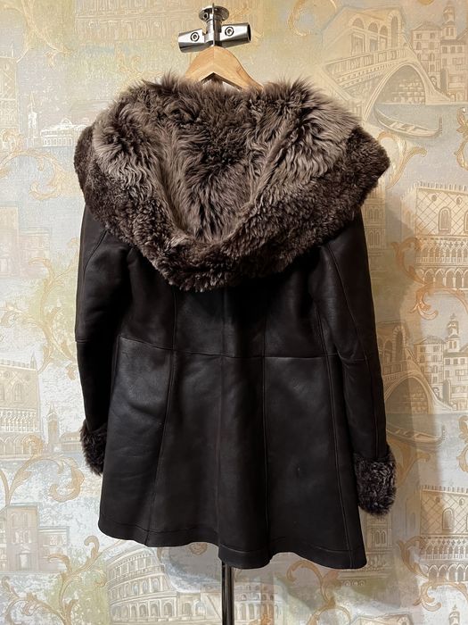 Натуральная меховая женская дубленка,коричневого цвета.Размер L