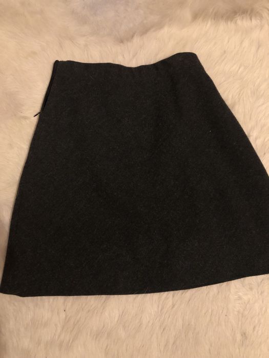 Conjunto mini saia casaco comprido, com botões usado