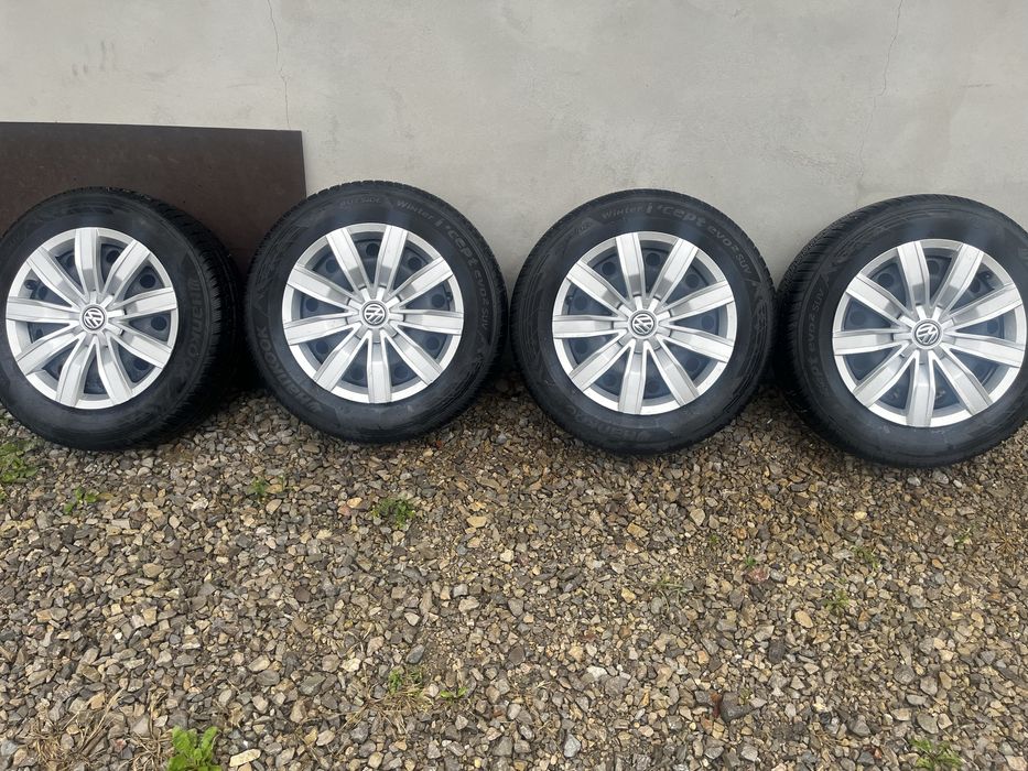 Koła opon zimowe 215/65R17 Hankook felgi kołpaki pasuja do VW Tiguan.
