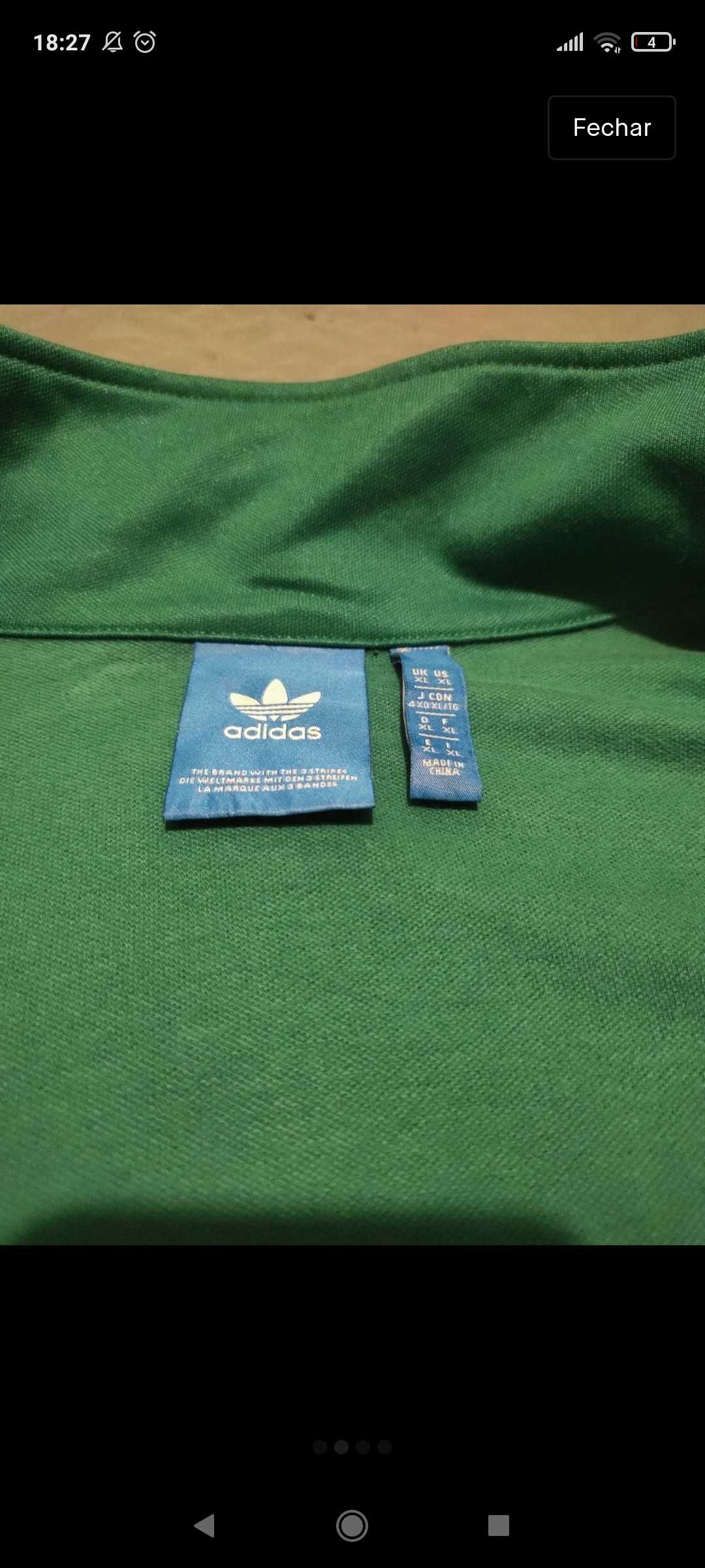 Casaco verde e preto da adidas