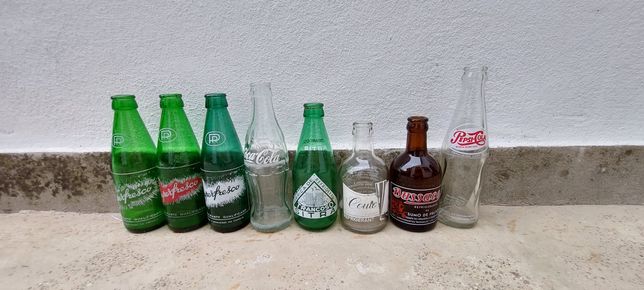 Garrafas antigas refrigerantes
