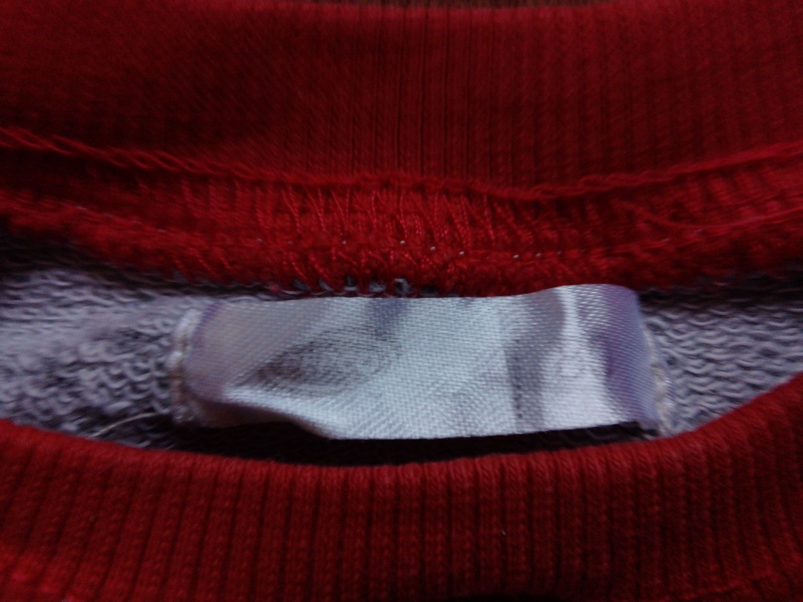 Bluza, r. 80, wkładana przez głowę.