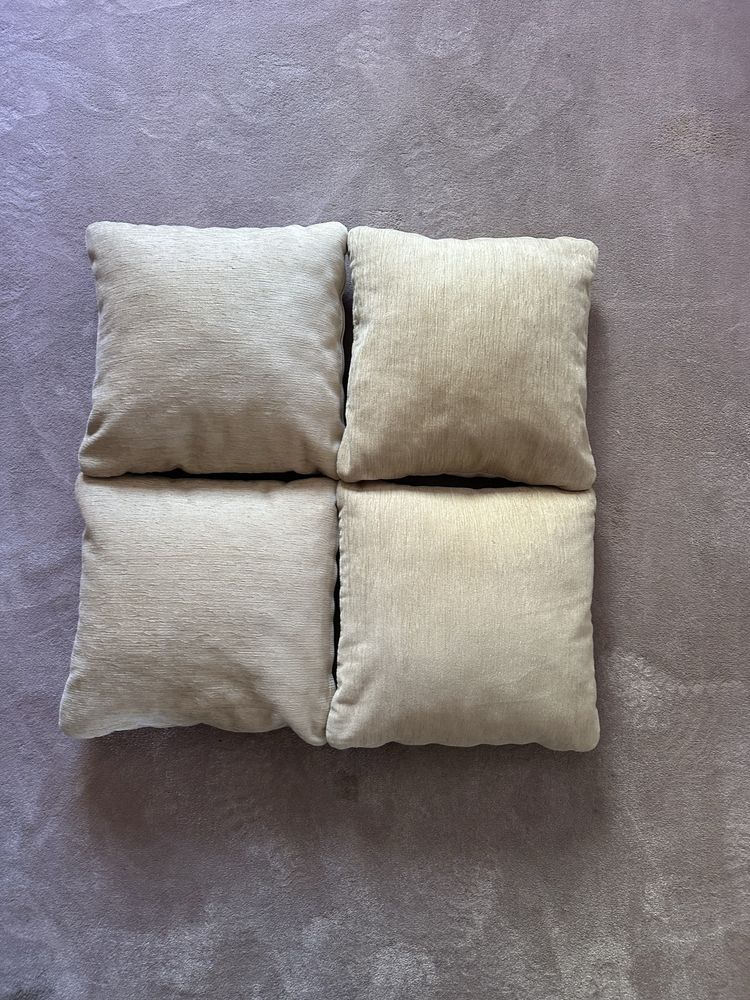 Quatro almofadas bejes 0,40x0,40