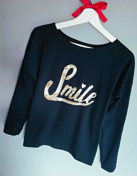 Czarna bluzka z napisem Smile złote cekiny