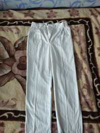 Білі брюки жіночі