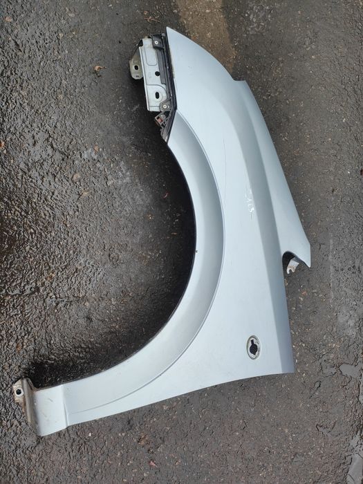 Opel Meriva A błotnik lewy przód Z163