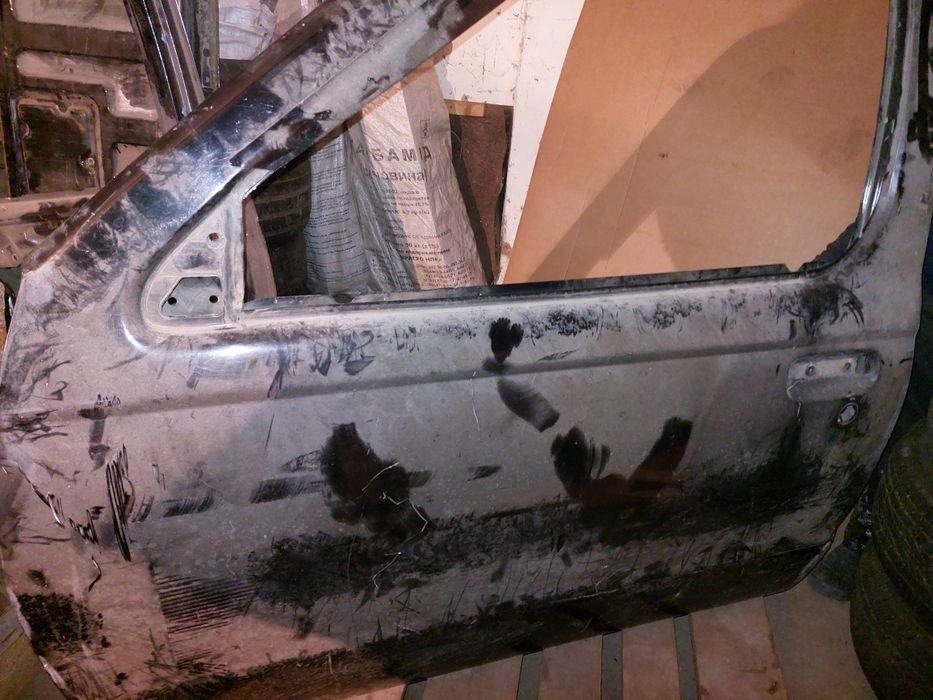 Двері ліві передні та задні,  NP300 Nissan