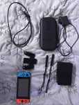 Nintendo Switch + Akcesoria + 4 Gry