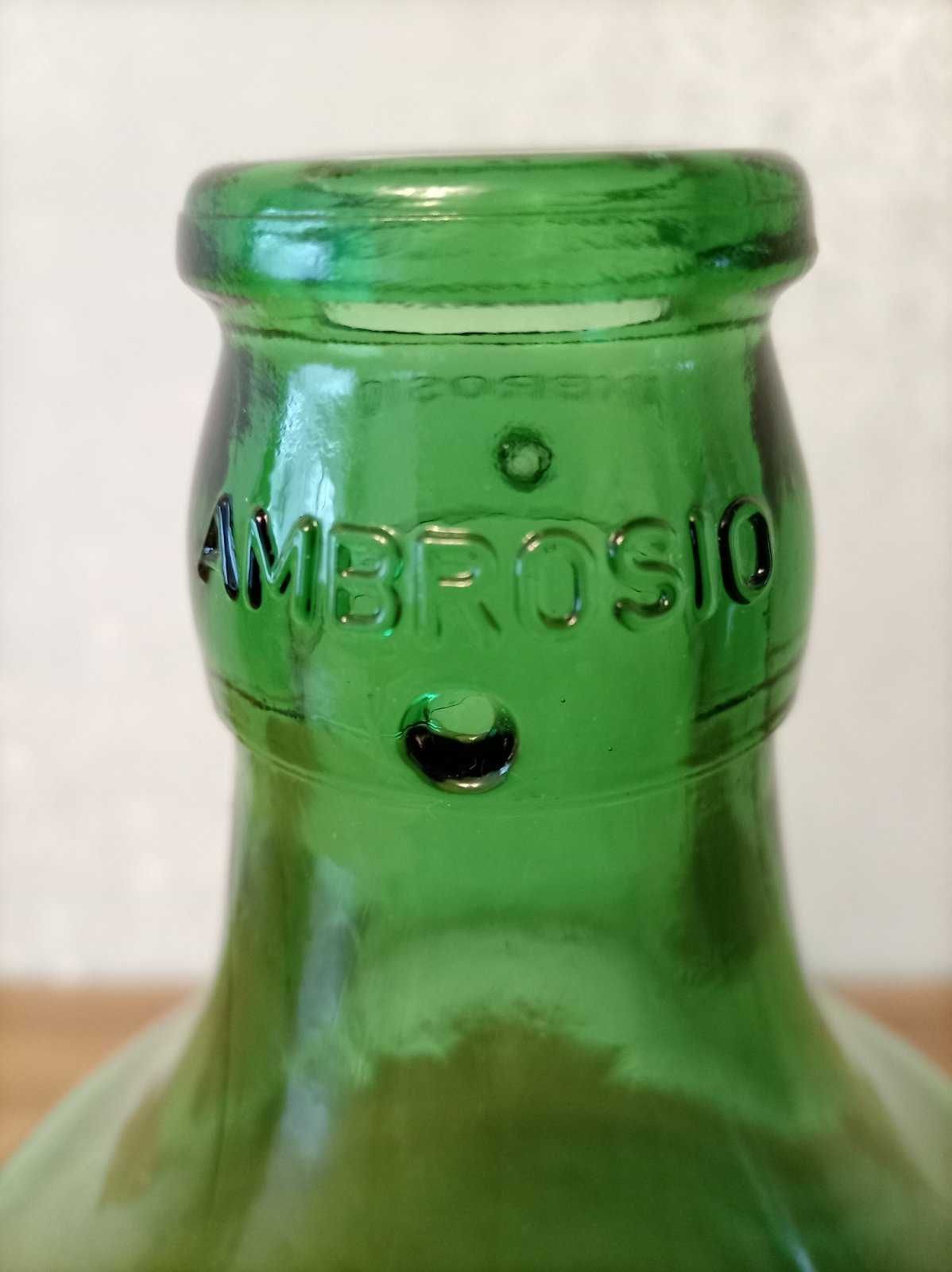 Бутель скляний Ambrosio в пластиковому кошику 5л