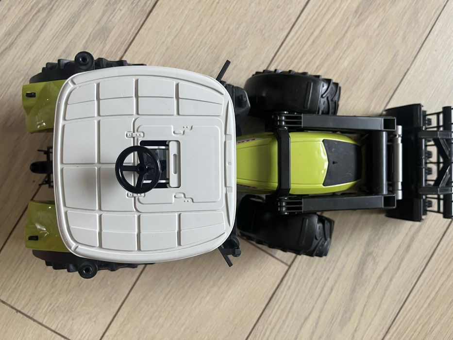 Bruder брудер трактор з навантажувачем Axion 950