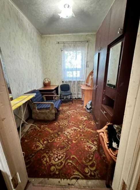 Продам кирпичный Дом на поселке  Строителей в городе Каменское.