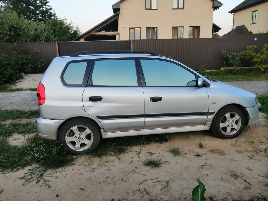 Мицубиси спейс стар 2002