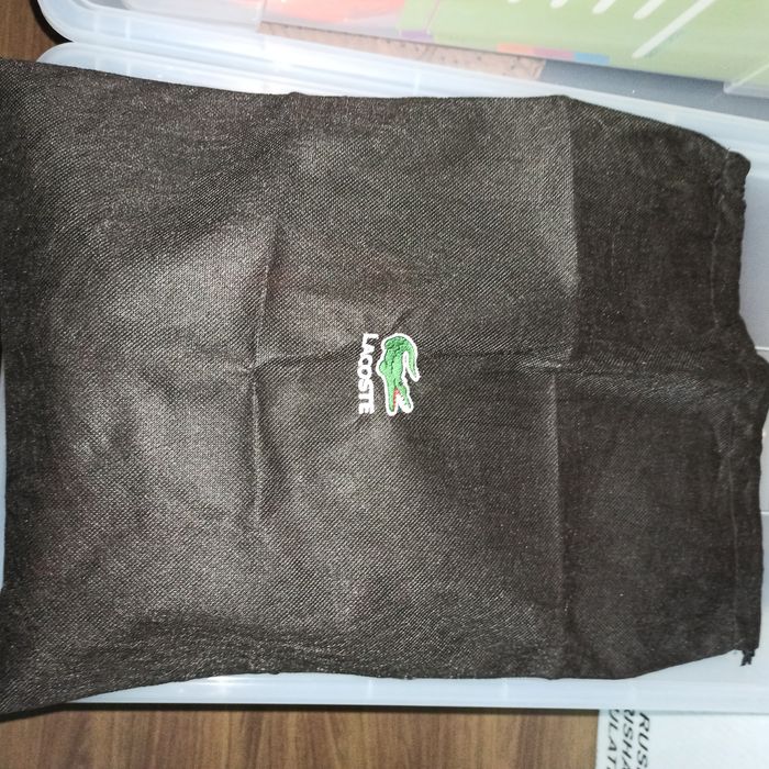 Mochila Lacoste amarela nova