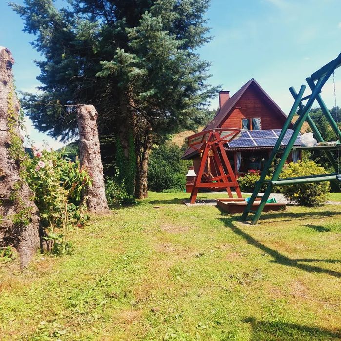 Sam na ogrodzonym terenie piec kaflowy domek chatka Jaśka