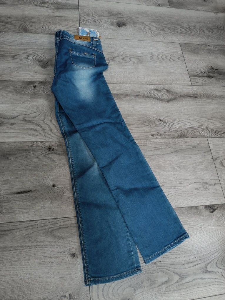 Spodnie jeans damskie