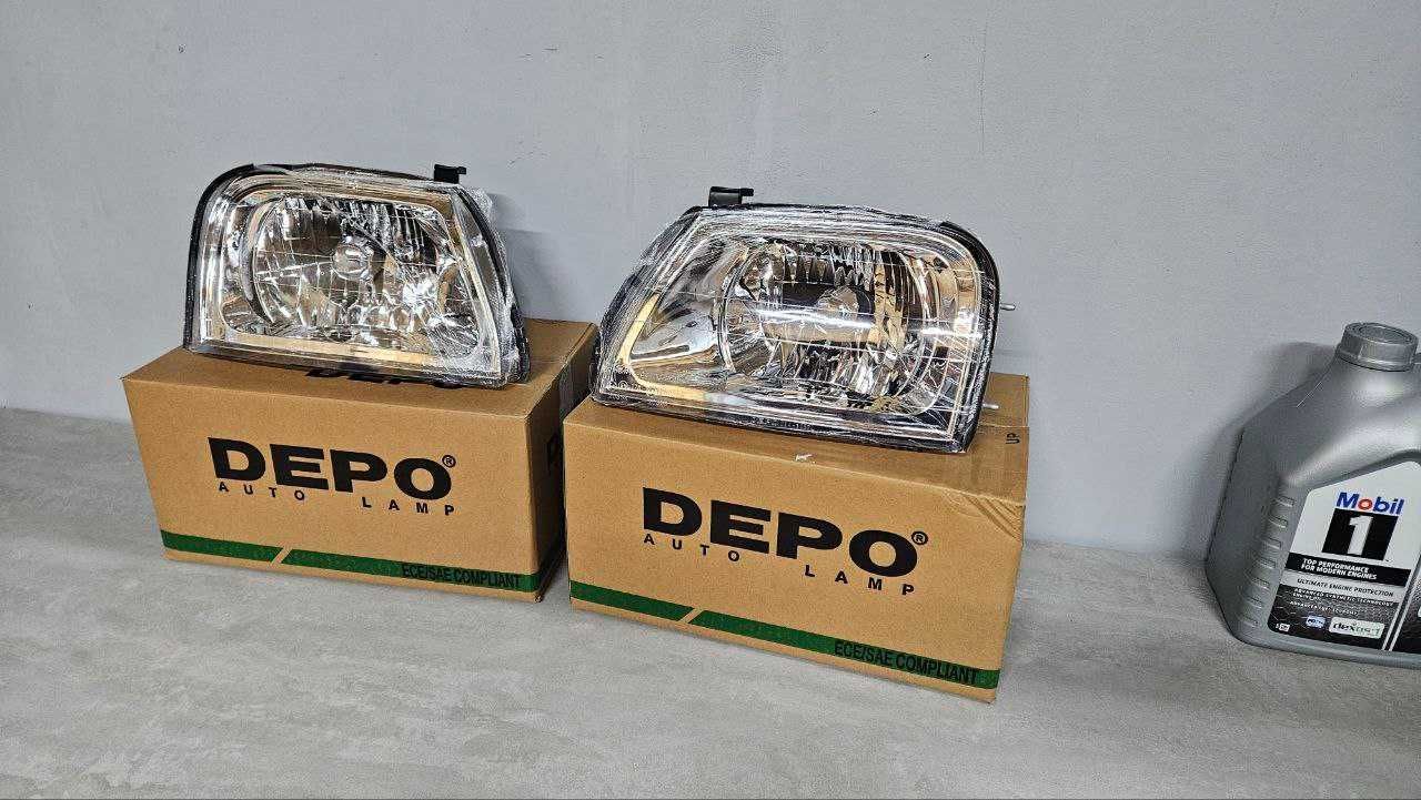 Фара передня Mitsubishi L200