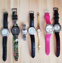 Kolekcja zegarków damskich i męskich na rękę.