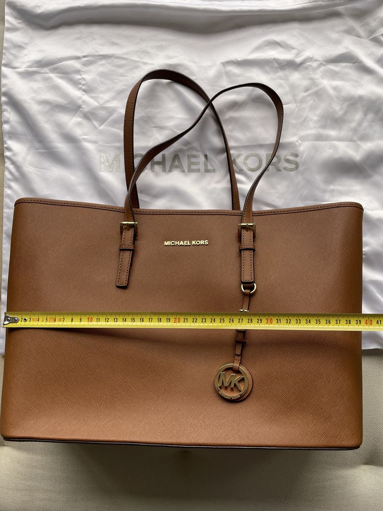 Mala Michael Kors como nova