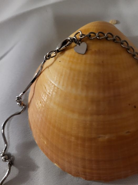 Fio prateado em excelente estado