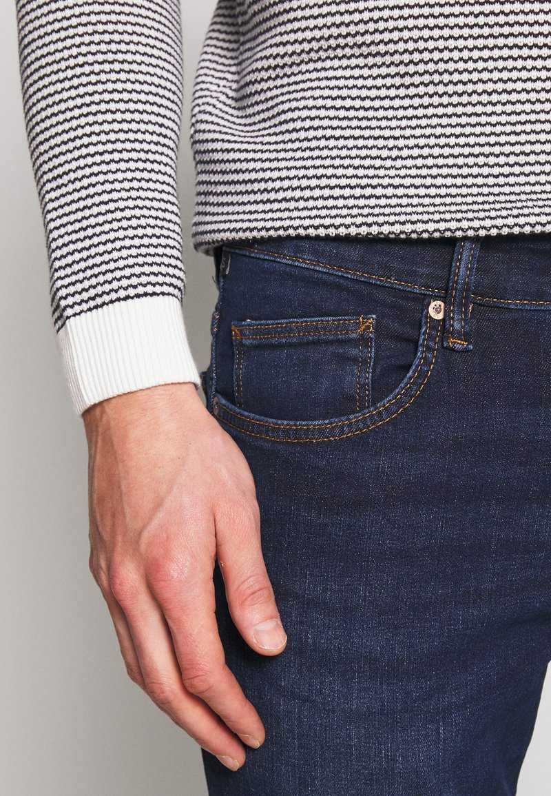 QS by s.Oliver Jeansy Slim Fit dark-blue denim spodnie jeansowe dżinsy