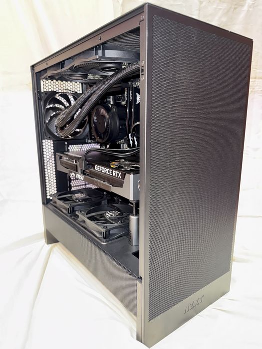 Komputer MSI RTX 5080 Ryzen 9800X3D 64GB RAM DDR5 CL28 3TB SSD AIO