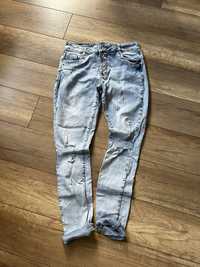 Superelastyczne jeansy z guzikami rozmiar 36