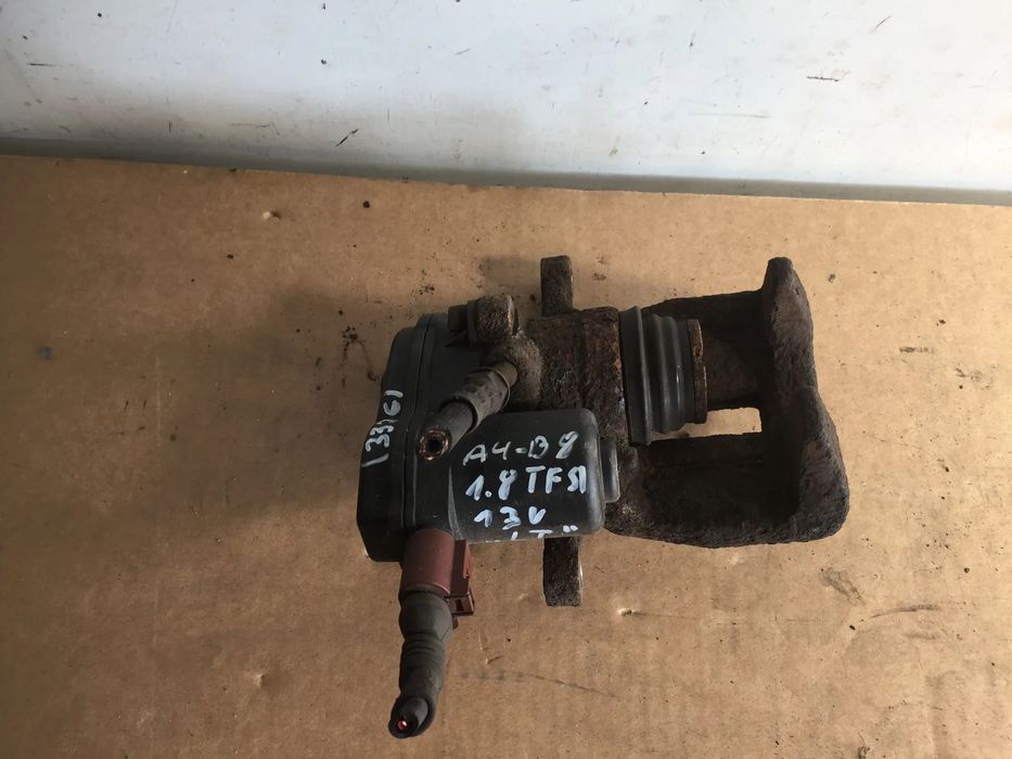 AUDI A4 B8 13R 1.8 TFSI ZACISK HAMULCOWY LEWY TYŁ TRW