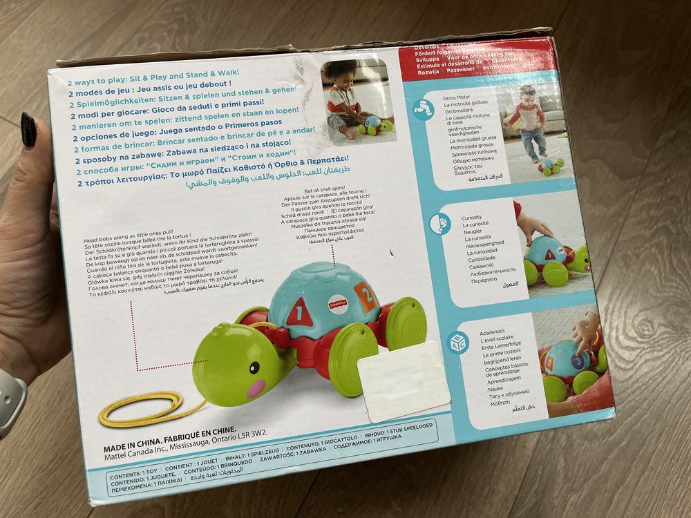 Черепаха каталка бренду Fisher Price
