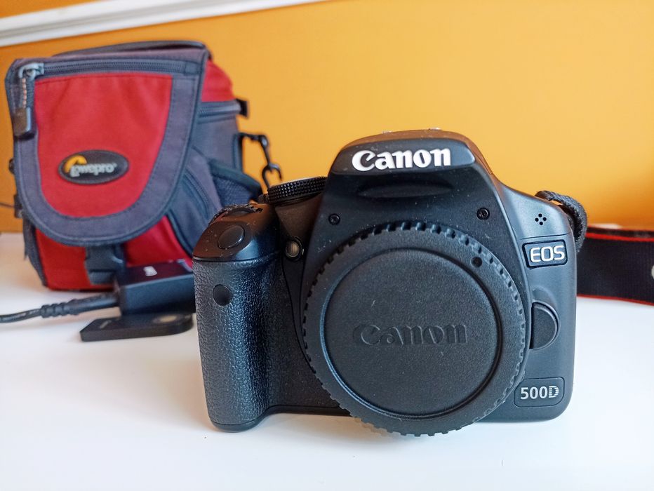 Canon EOS 500D DSLR (+bolsa, baterias, carregador)
Inclui câmara(c