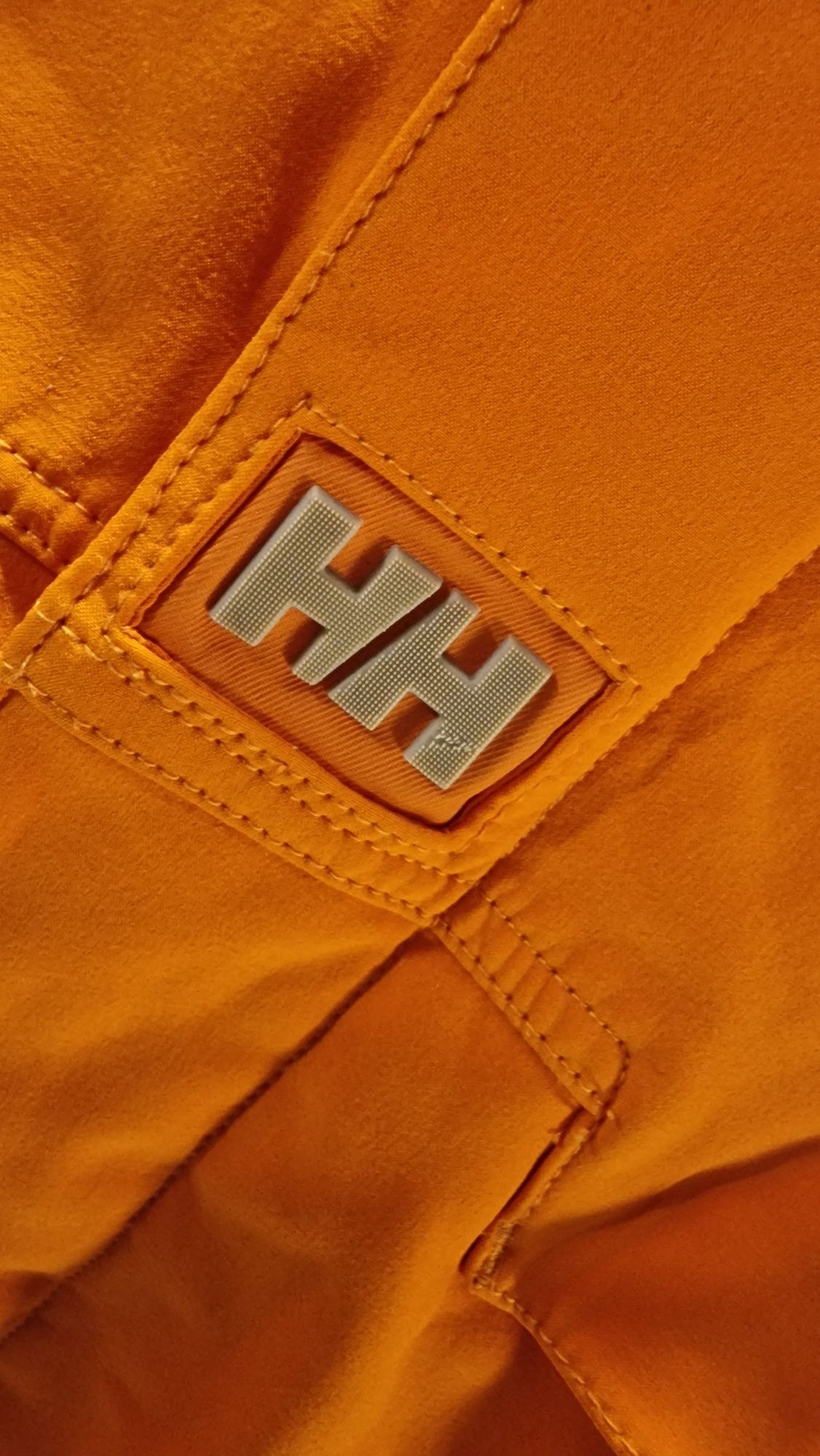 Piękna kurtka Helly Hansen  pomarancz L super